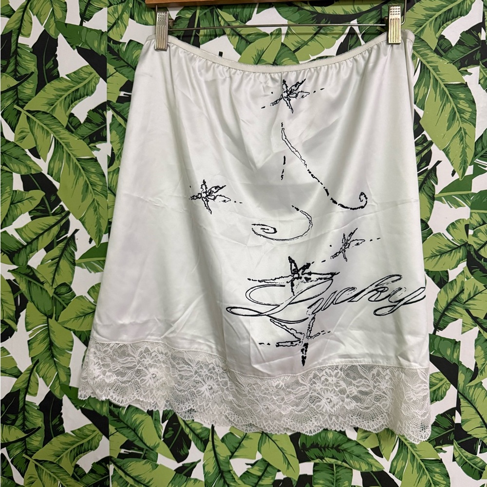 White Skirt with Black Star Embroidery and Lace Trim
